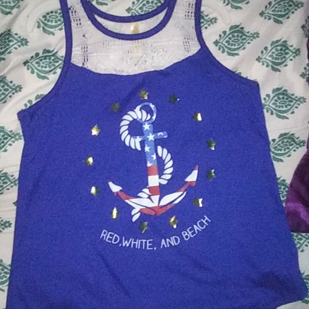 A blue tank top with an anchor on the front.